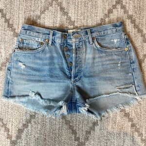 Agolde, Parker distressed demin shorts.